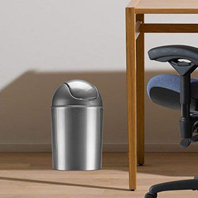 Umbra swing-top lid mini trash bin ideal for compact spaces.