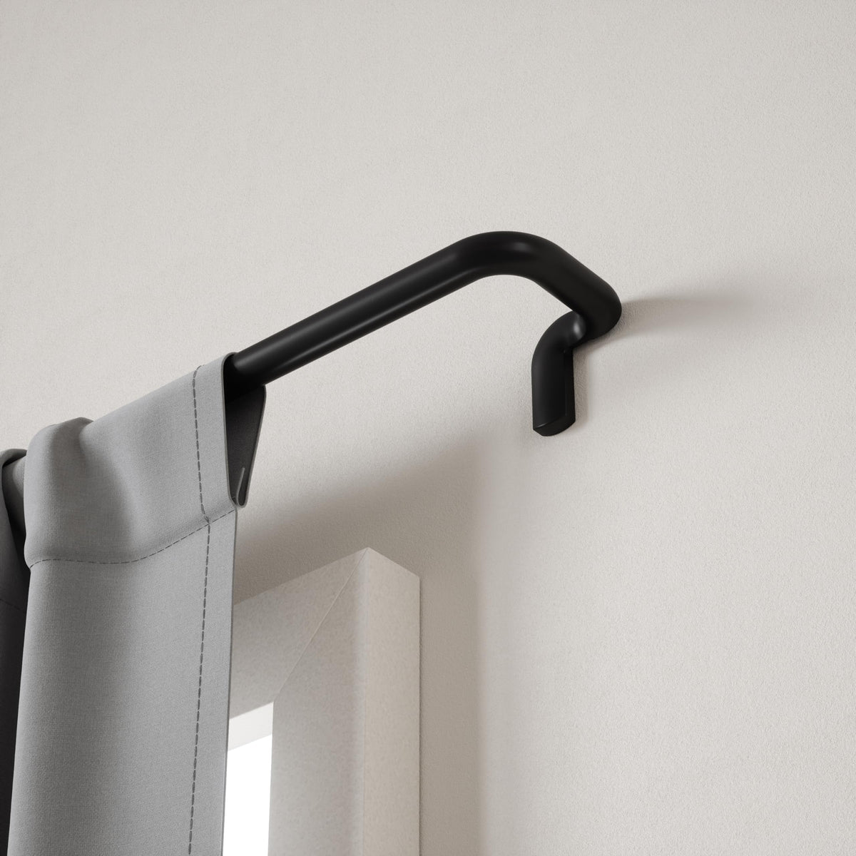 Umbra Twilight durable metal construction ensures long-lasting room darkening.