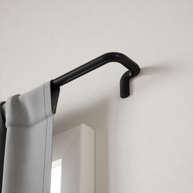 Umbra Twilight durable metal construction ensures long-lasting room darkening.