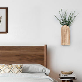 Umitiu decorative wall art vase adds natural texture to spaces.