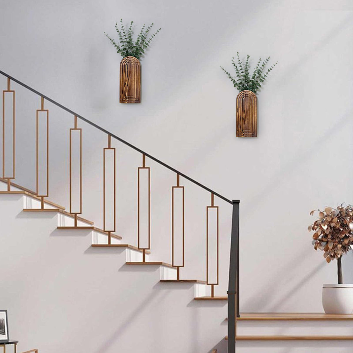 Umitiu two-pack wall decor planters make gift-ready home accents.
