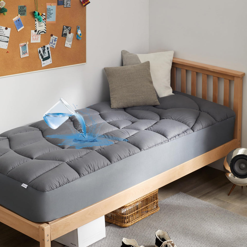 UNIKOME waterproof twin mattress protector with soft breathable microfiber for cooler nights.