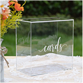 UNIQOOO wedding decor setup features a clear box centerpiece for reception styling.