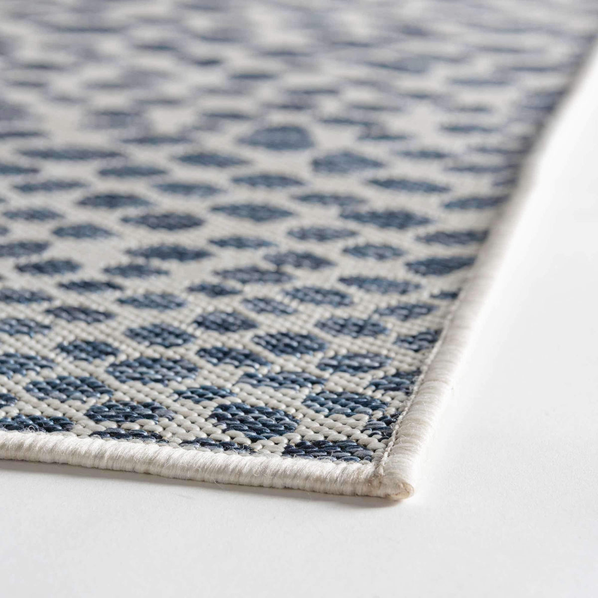 Unique Loom Cape Town outdoor rug blue olive; easy-clean surface supports busy families.