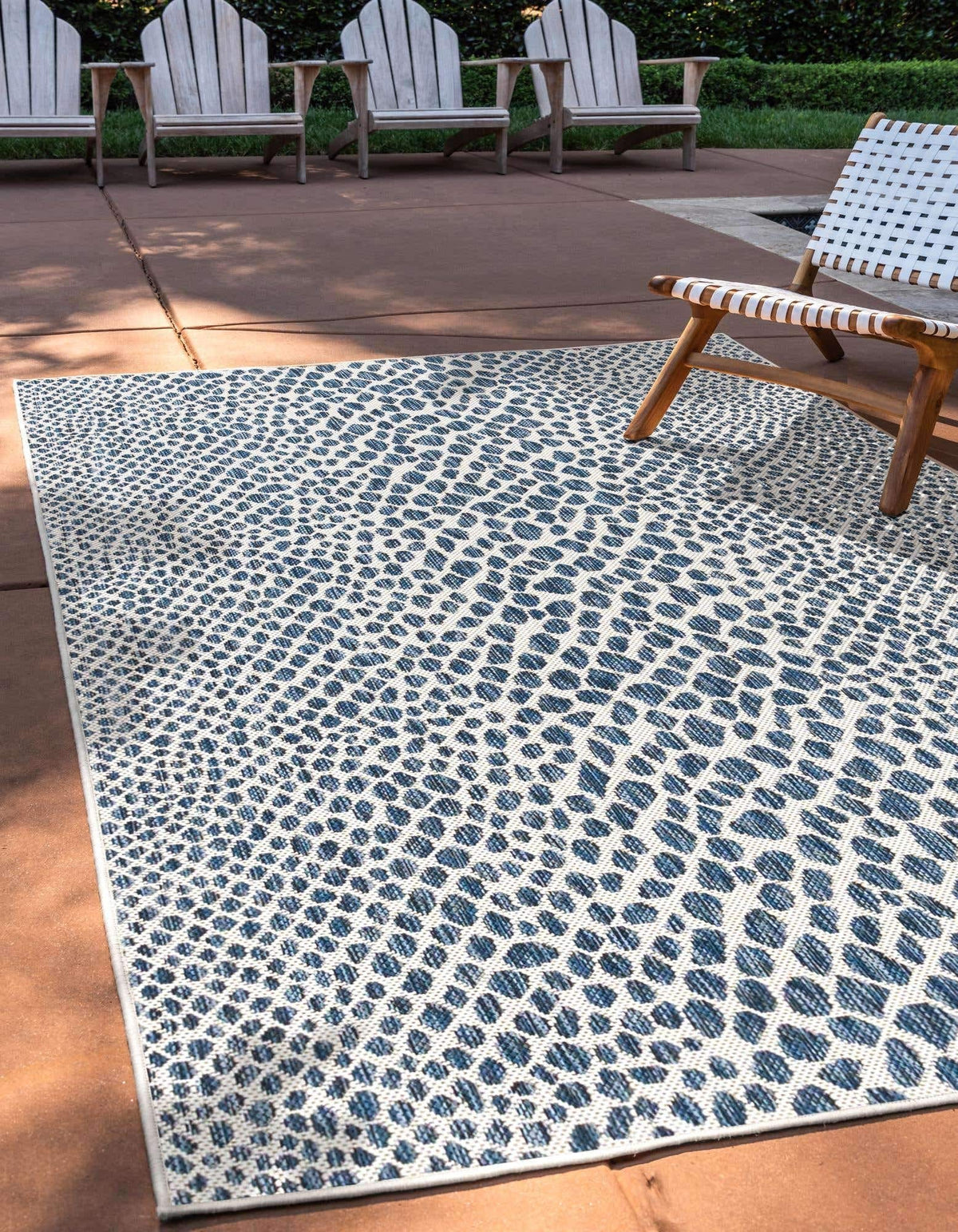 Unique Loom Cape Town outdoor rug blue olive; wide shot shows patio-ready style.