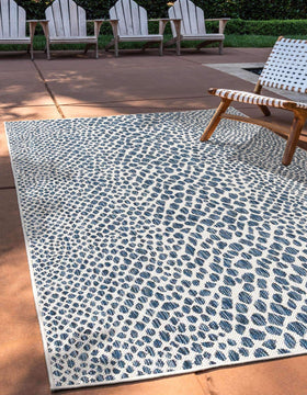 Unique Loom Cape Town outdoor rug blue olive; wide shot shows patio-ready style.