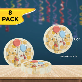 Unique Winnie the Pooh dessert plates add playful touches to dessert courses.