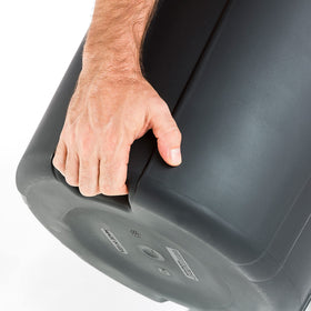 United Solutions waste container with pass-through handles enables easy transport.
