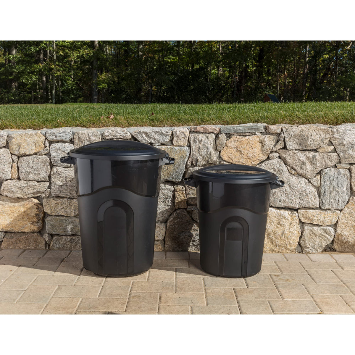 United Solutions outdoor-ready round bin on a patio highlights sleek finish.