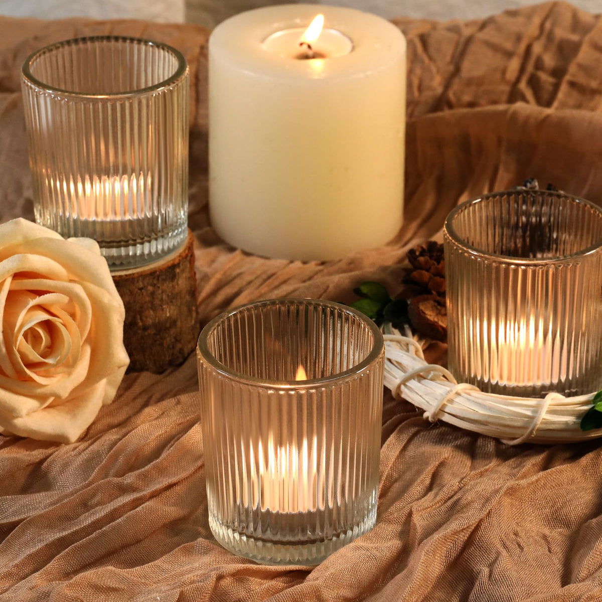 Uniteland clear glass tea light holder is shown on a long tablescape.