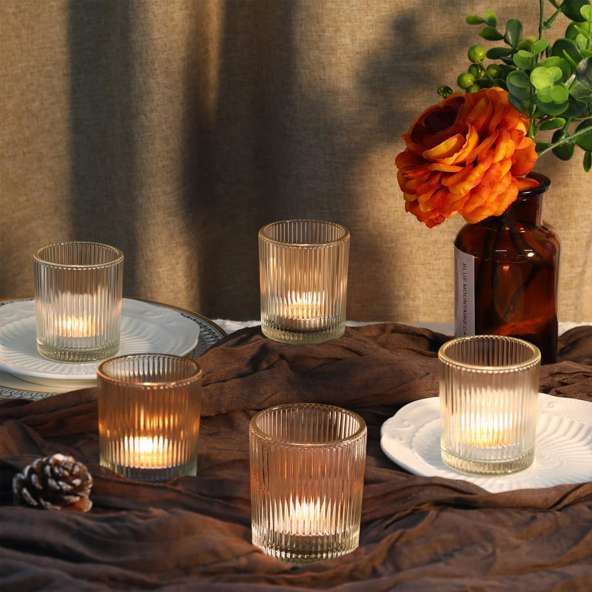 Uniteland votive holders add sparkle to baby shower table decor.