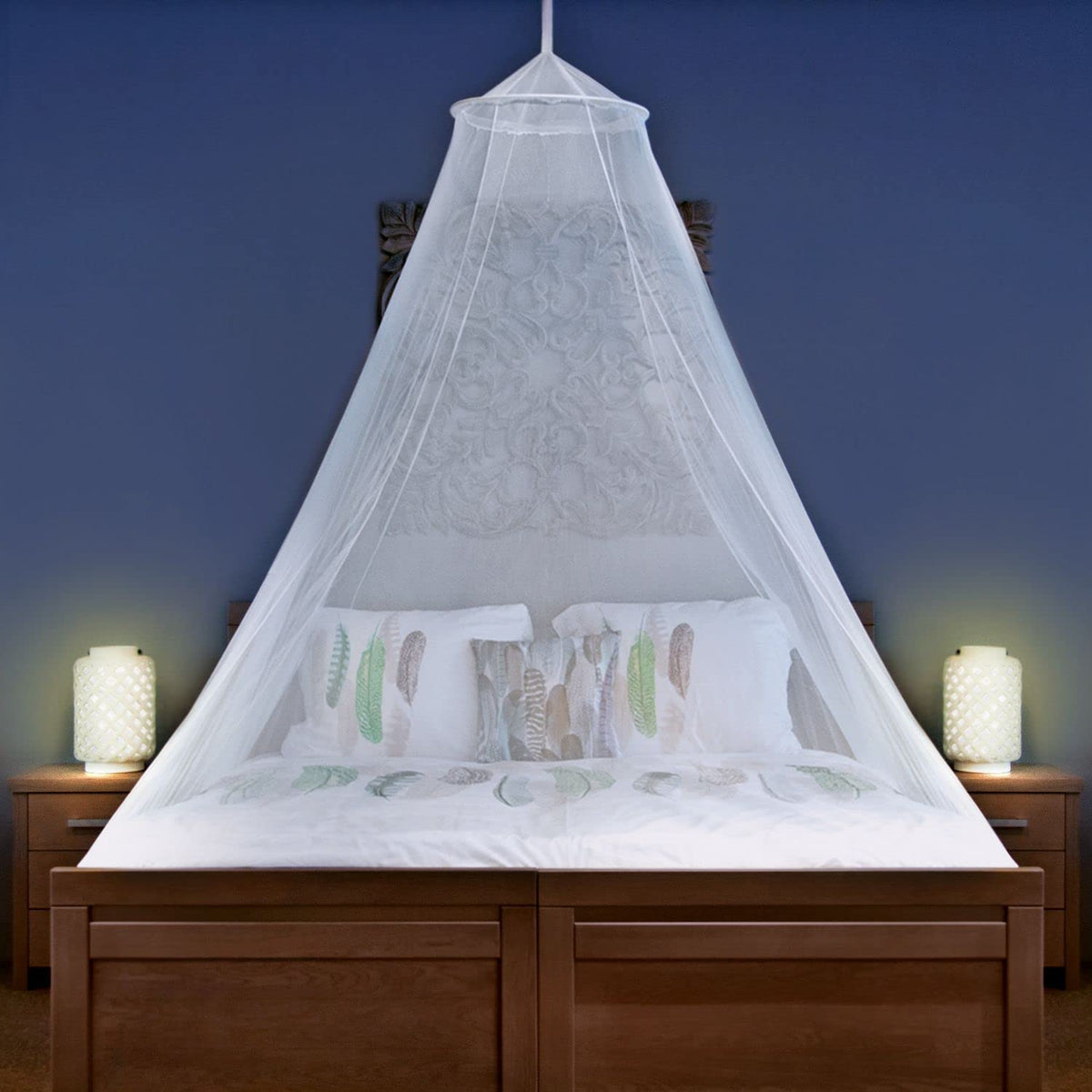 Universal Backpackers mosquito net—fully enclosed around the bed for complete protection.