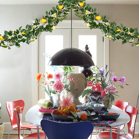 U'Artlines lemon garland on mantel adding warm seasonal ambiance
