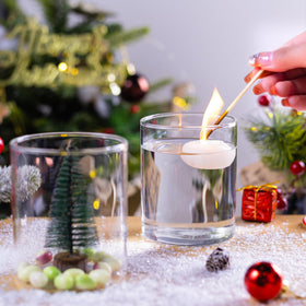 UPBUD floating candle display vase creates soft light accents