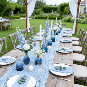 UPBUD Navy blue glass vases highlight textured detail for bohemian-inspired tables.