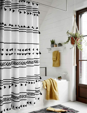 UpHome boho shower curtain with black and white geometric stripes adds privacy and modern style.