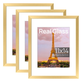 Upsimples 11x14 gold frame on wall with crystal-clear HD glass.