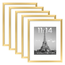 Upsimples 11x14 gold frame set in a gallery arrangement for cohesive home decor.