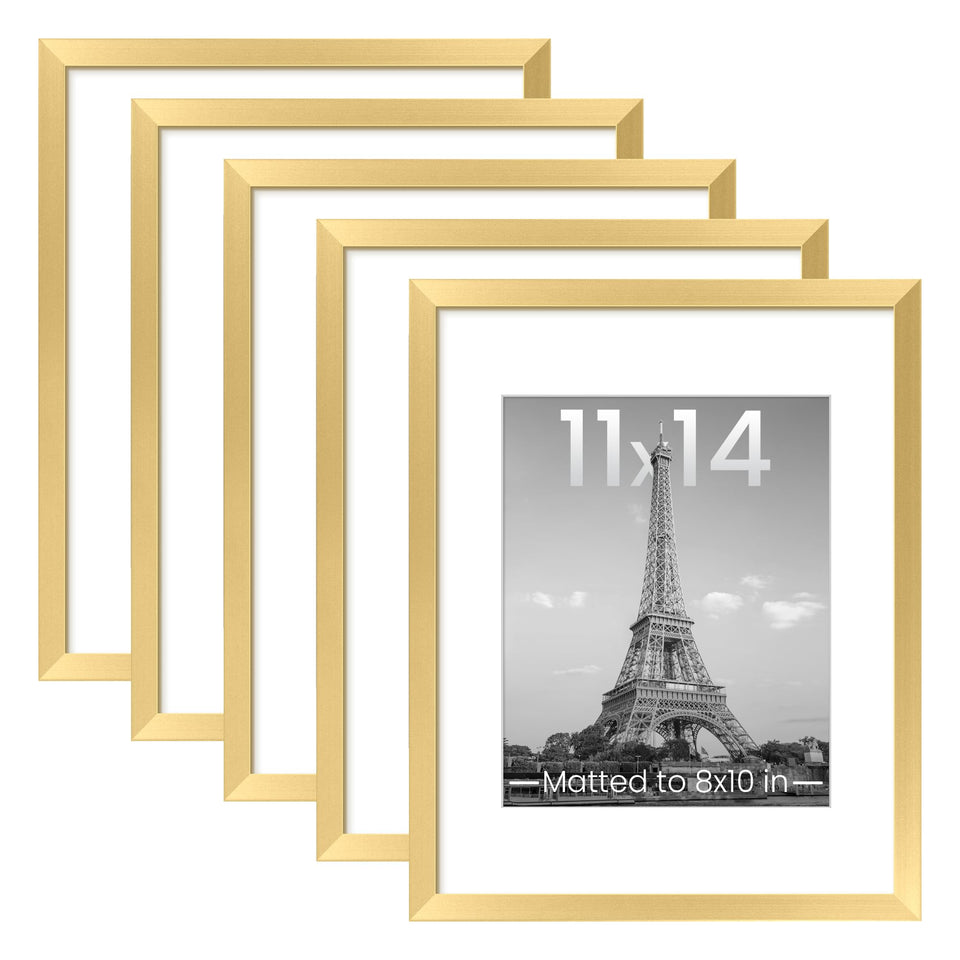 Upsimples 11x14 gold frame set in a gallery arrangement for cohesive home decor.