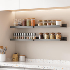 Upsimples floating shelves add storage and style to a bedroom.