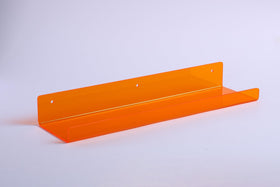upsimples kid-friendly wall shelf helps organize toys and books.