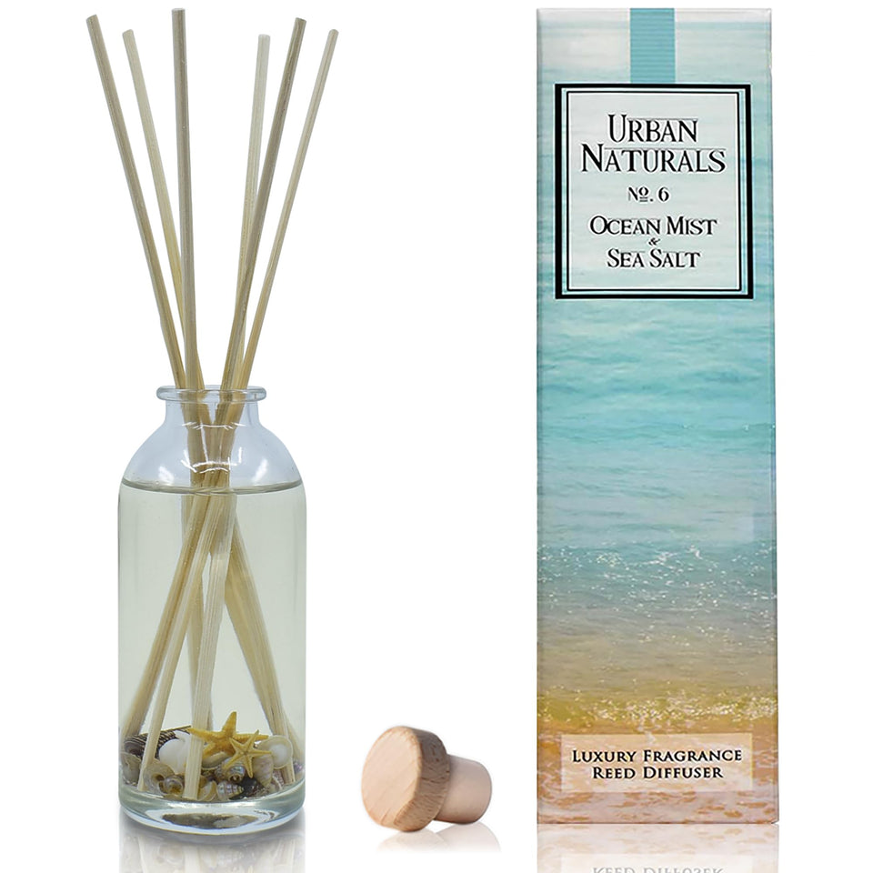Urban Naturals Ocean Mist diffuser bottle with seashells for a calming coastal aroma.
