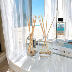Urban Naturals real seashells add tactile coastal charm to the diffuser set.