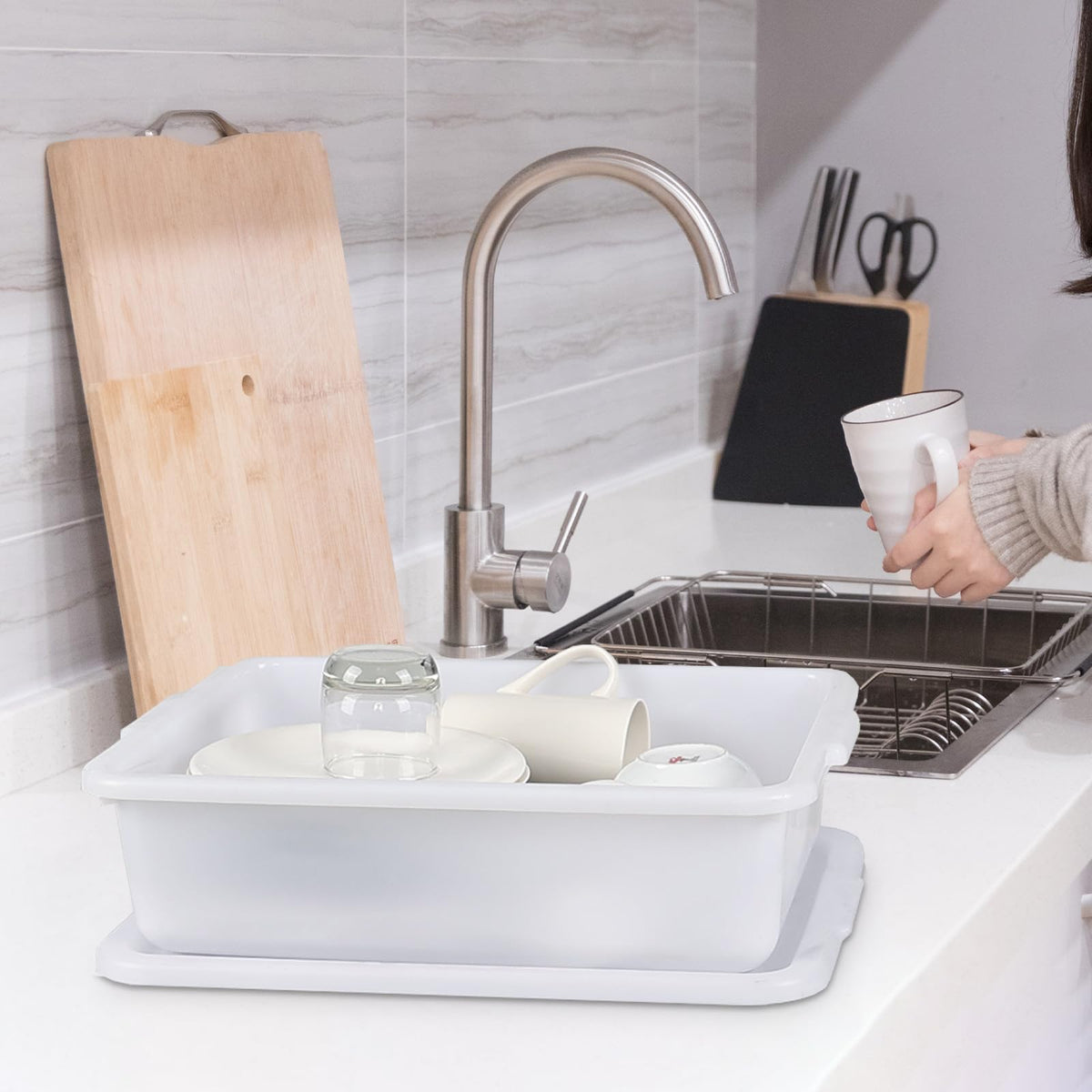 Utiao white bus tub with extended handles for portable transport.