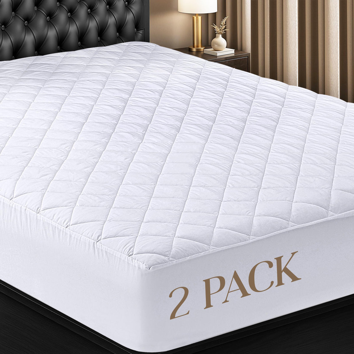 Utopia Bedding two-pack quilted fitted mattress pad for king beds with deep pockets.