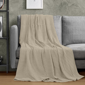Utopia Bedding all-season blanket used on couch or bed for warmth and breathability.