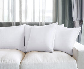 Utopia Bedding back-support use demonstrates 2-in-1 comfort on the couch.