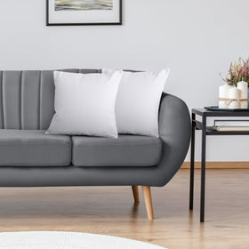 Utopia Bedding pillow insert on bed and sofa setup reflects cohesive decor.