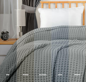 Utopia Bedding soft cotton blanket in cool grey enhances bedroom décor.
