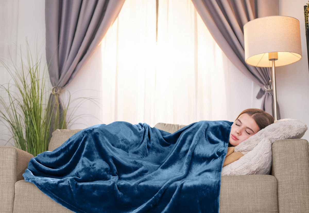 Utopia Bedding blanket on sofa during movie night setup