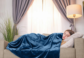 Utopia Bedding blanket on sofa during movie night setup
