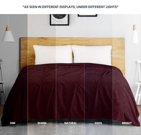 Utopia Bedding burgundy blanket draped over sofa adds cozy living room accent