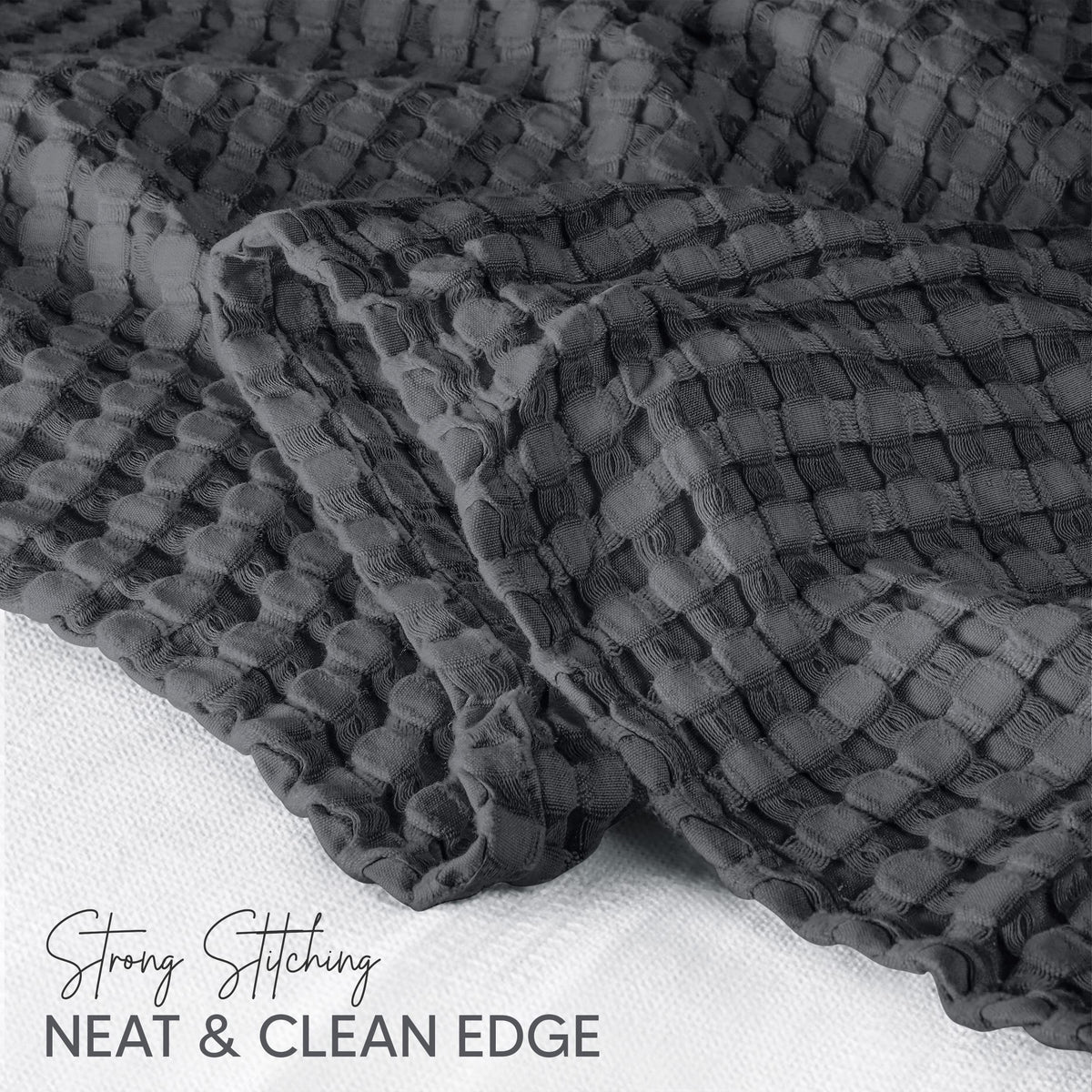 Utopia Bedding blanket draped over sofa creates inviting, cozy living room feel.