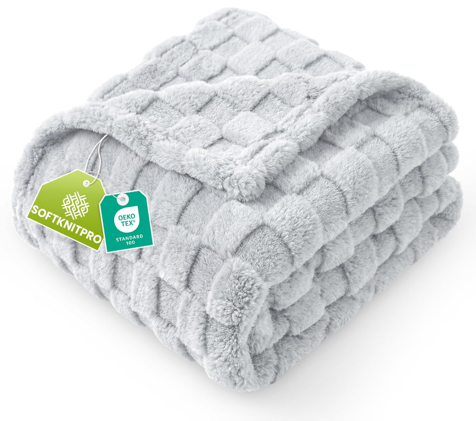 Utopia Bedding Cool Grey Checkered Fleece Blanket on a sofa for cozy evenings