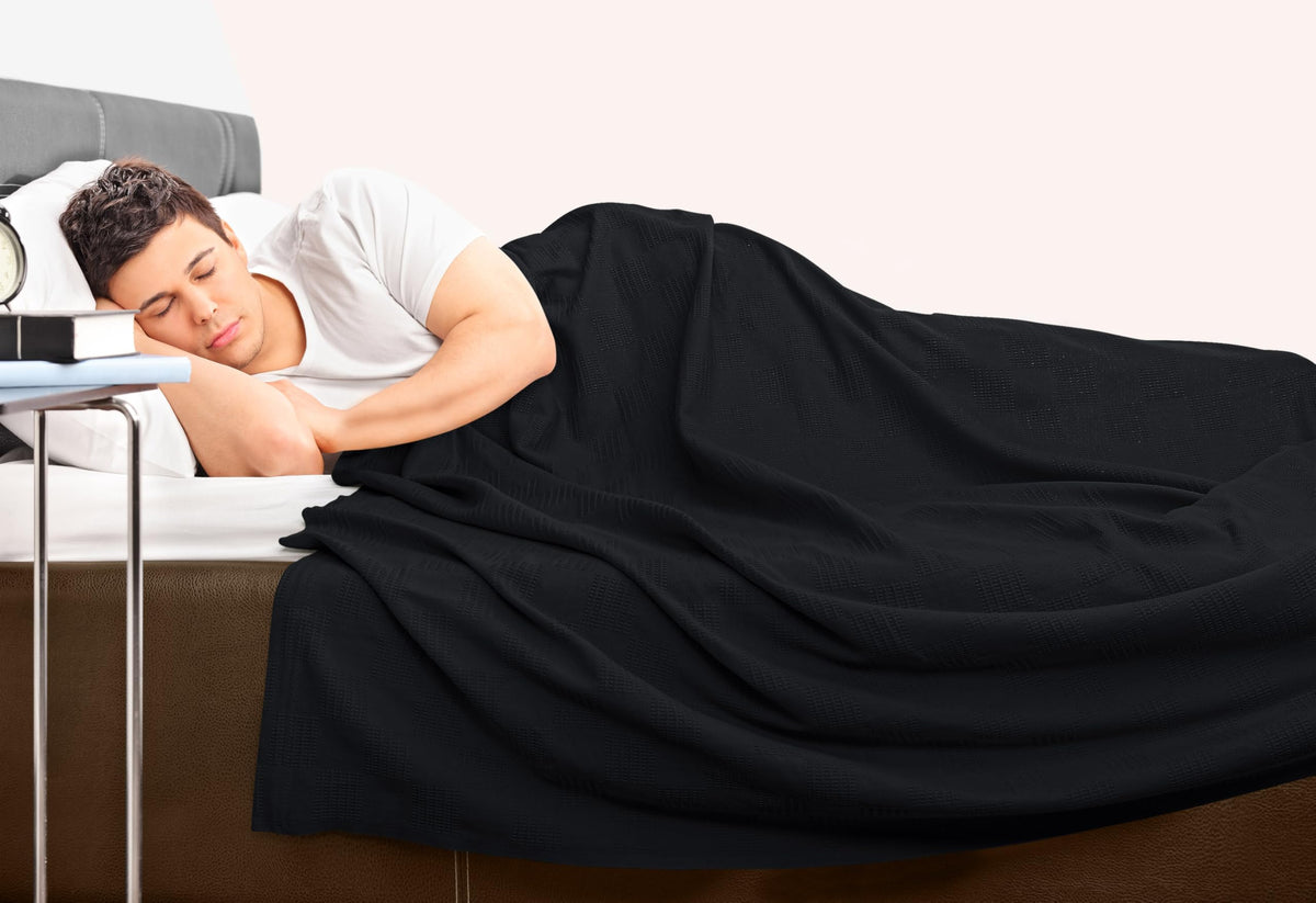 Utopia Bedding blanket styled on bed, lightweight and breathable for spring evenings.
