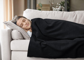 Utopia Bedding draped over sofa, versatile decor with cozy feel.