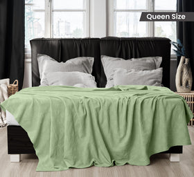 Dobby weave thermal blanket in Sage Green adds texture on bed by Utopia Bedding.