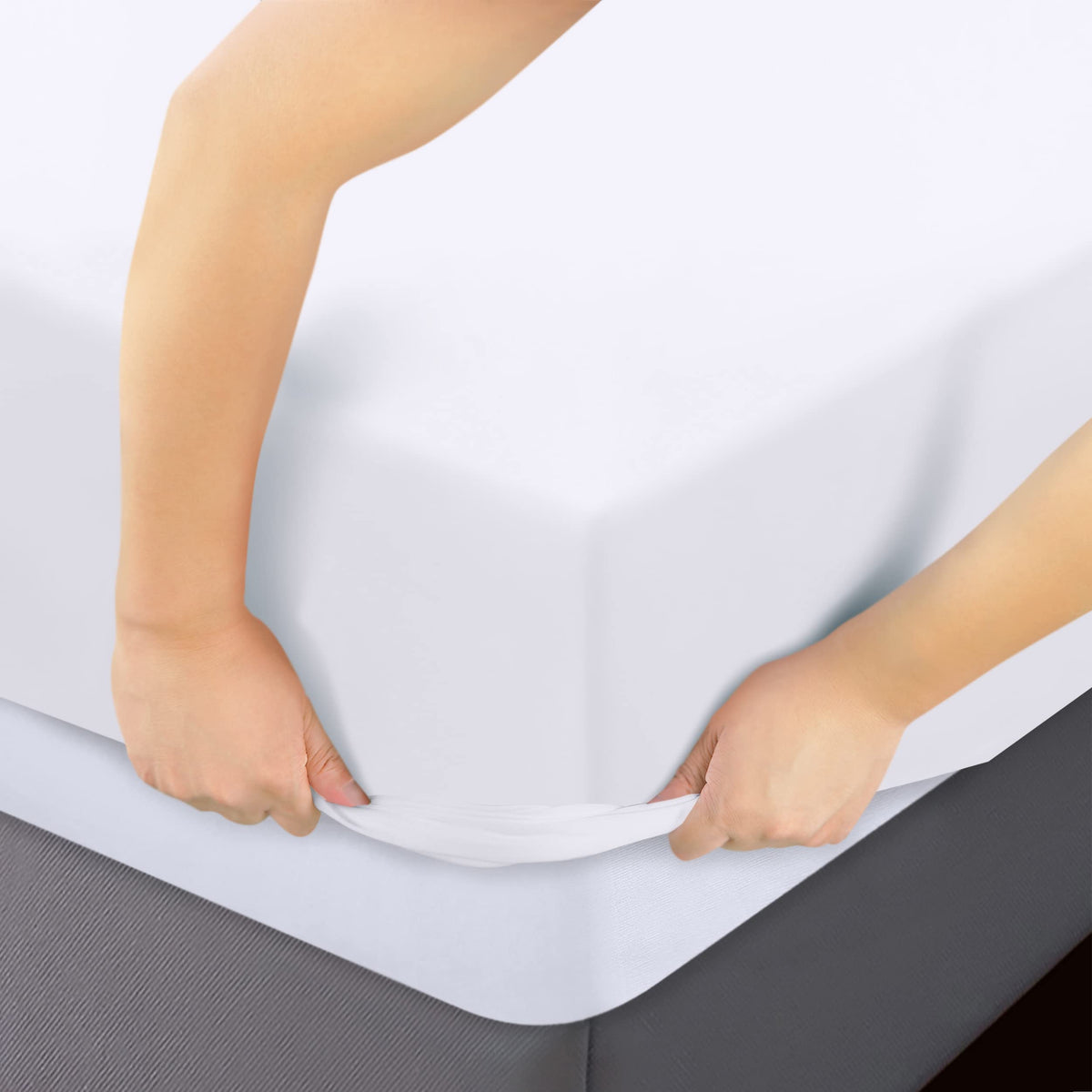 Sheet on bed highlighting all-around elastic for snug edges