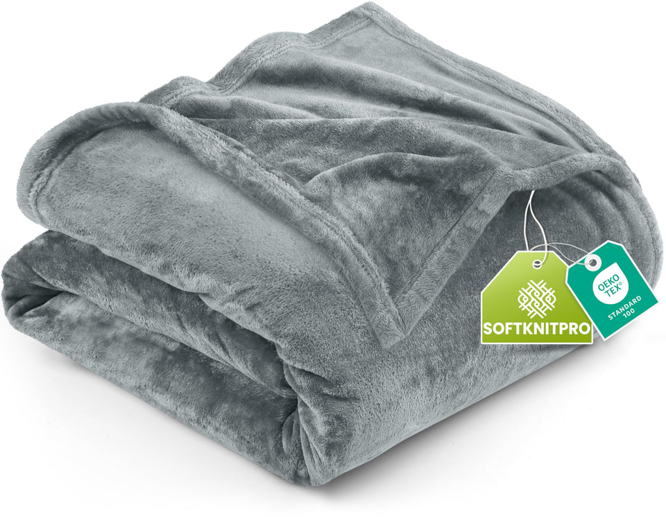 Utopia Bedding fleece blanket on bed with cozy all-season warmth