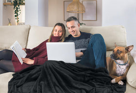 Utopia Bedding fleece blanket on a bed for all-season comfort.