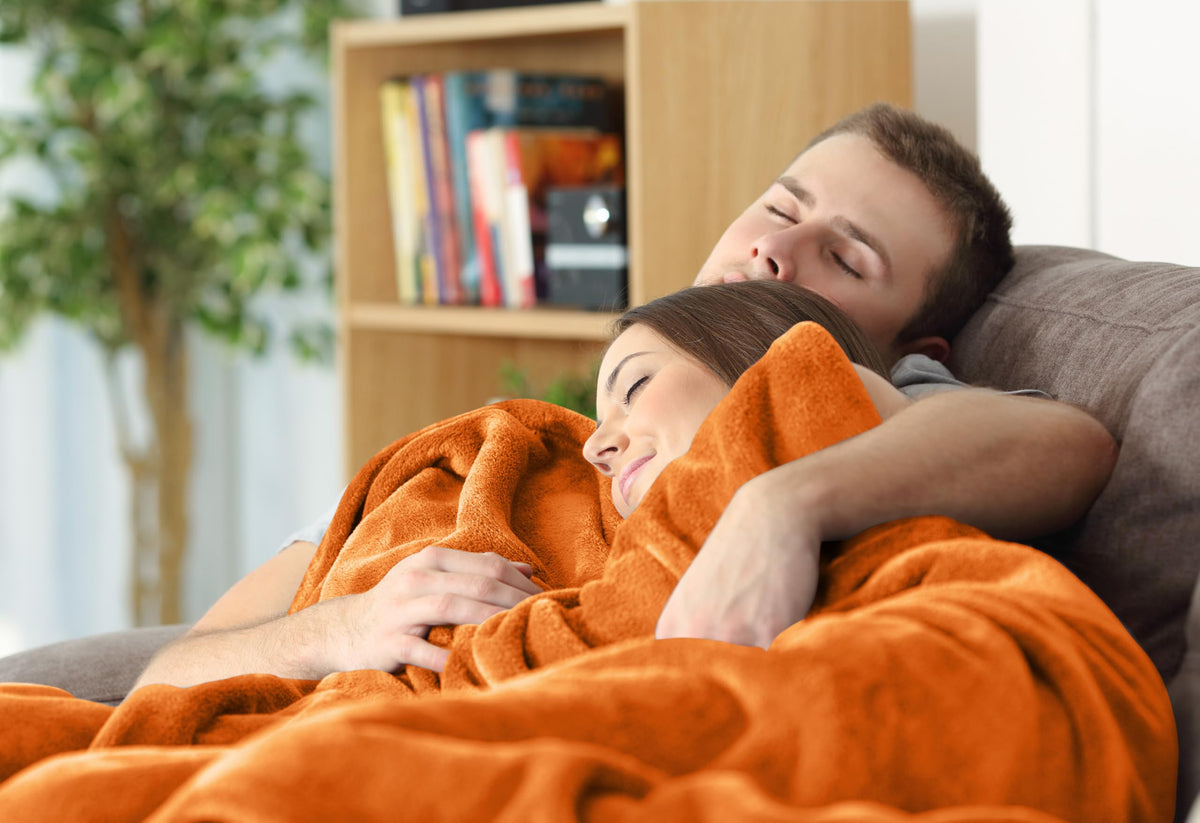 Burnt orange Utopia Bedding blanket enhances bedroom ambiance.