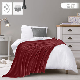 Utopia Bedding fleece blanket burgundy on bed offering soft warmth