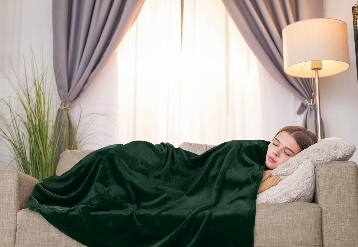 Cozy sofa setup with Utopia Bedding blanket ready for lounging
