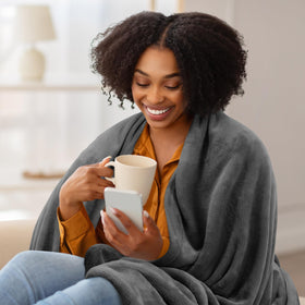 Utopia Bedding blanket grey hue adds elegant warmth to living space