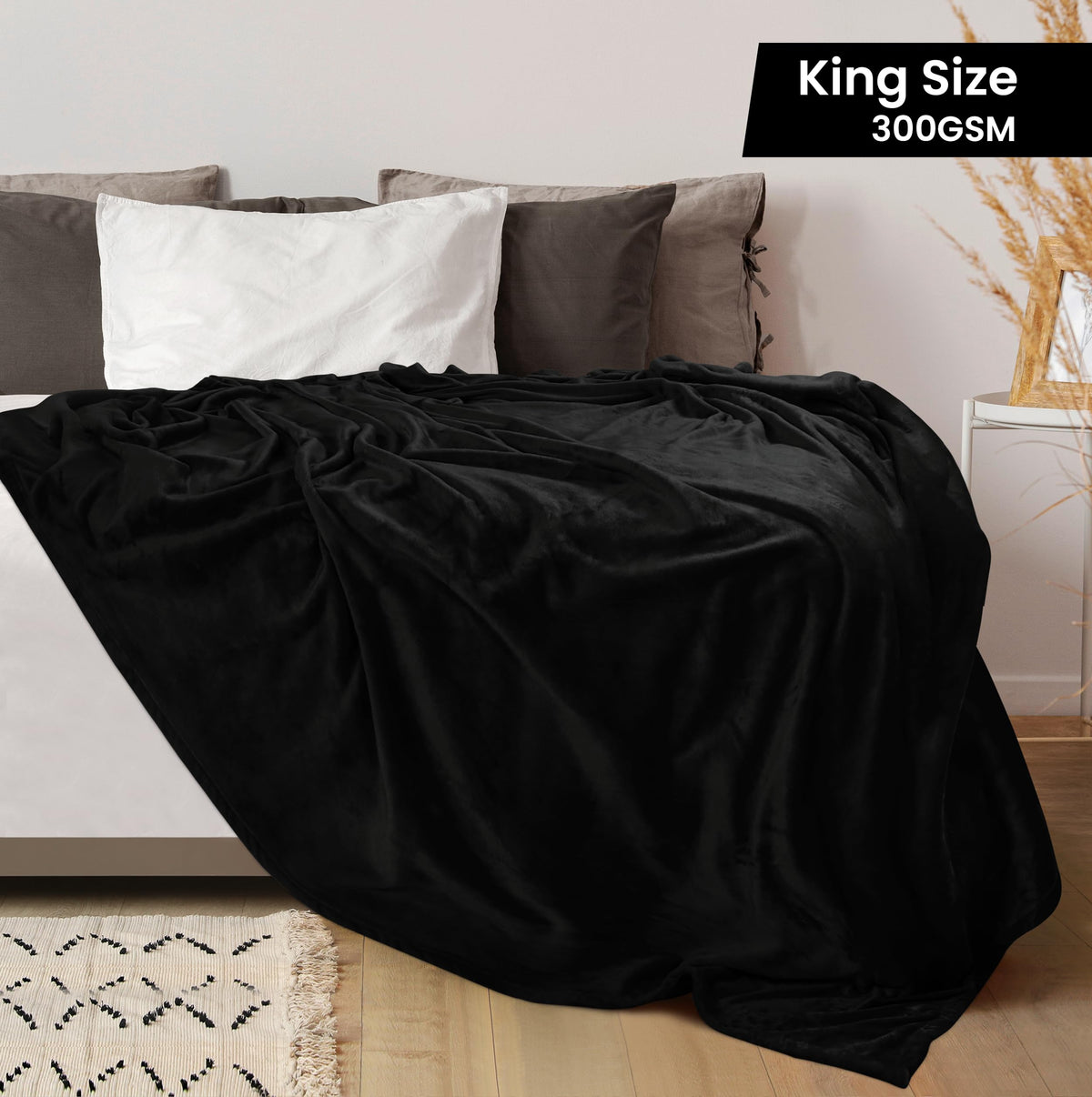 Utopia Bedding fleece blanket king size black spread over a bed for all-season warmth.