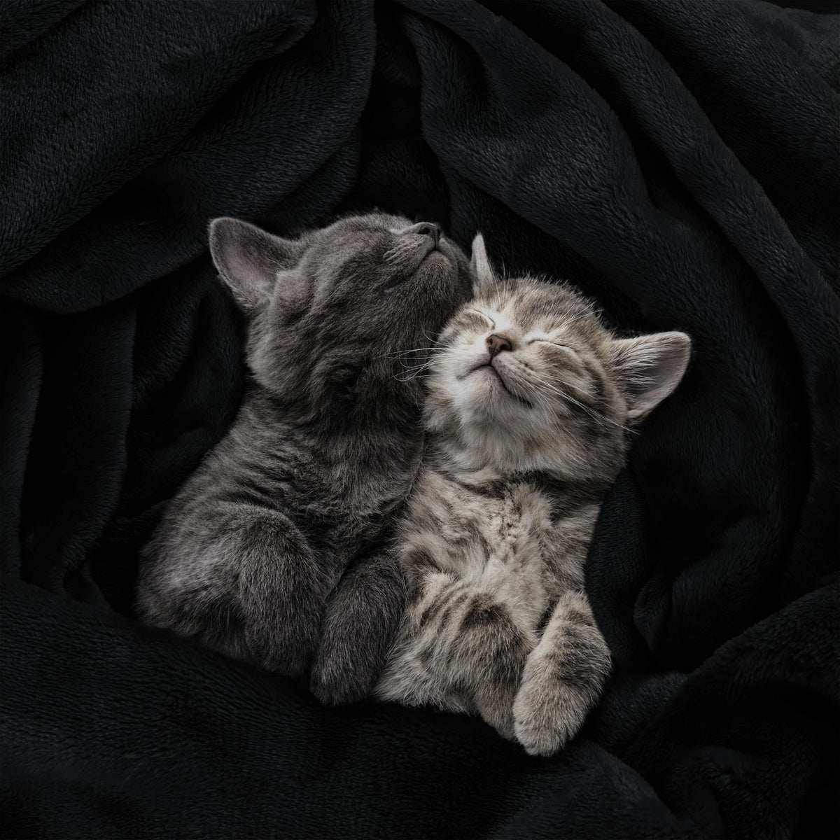 Detail of reinforced double-needle stitching on Utopia Bedding fleece blanket king size black.
